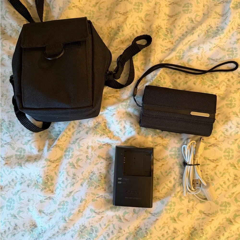 Canon Red Digital Camera with Black Accessories